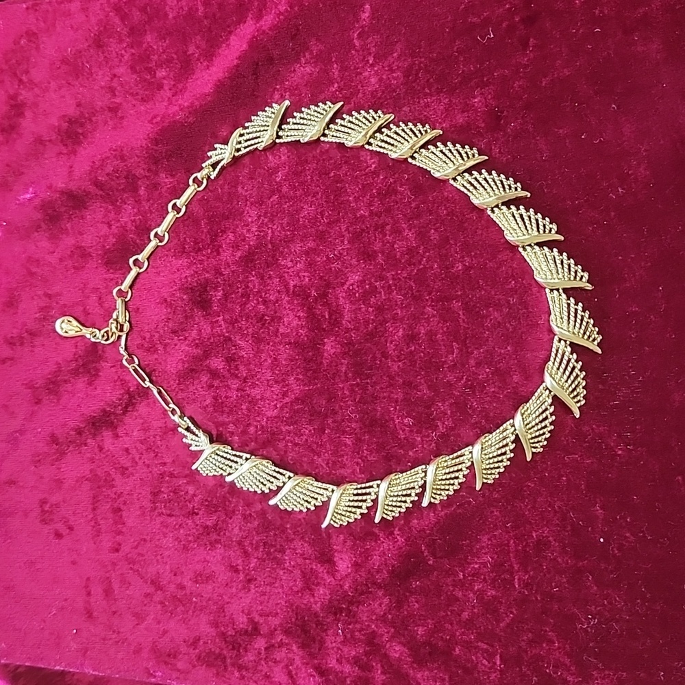 Gold tone necklace.